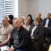 Учасники наради сидять у конференц-залі під час обговорення питань соціального захисту населення та забезпечення прав дітей.