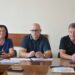 Троє представників керівництва та працівників Городоцької сільської ради сидять за столом під час робочої наради.