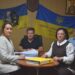 На фото — учасники засідання виконавчого комітету Городоцької сільської ради під час робочого обговорення питань порядку денного; на столі — документи та матеріали засідання, на задньому плані — державна та символічна атрибутика України.